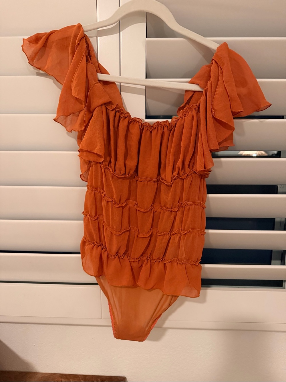 Free People Orange Ruffled Bodysuit XS Womens - never been worn